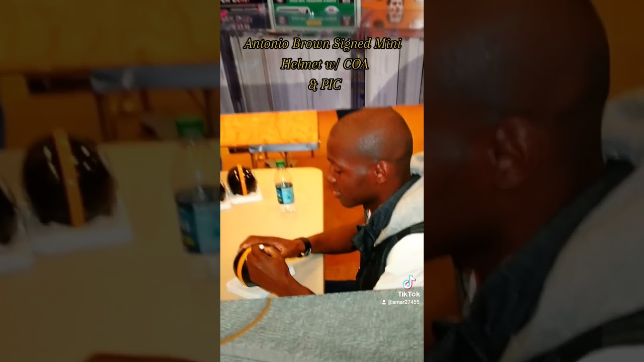 Antonio Brown Autographed Mini Helmet w/ COA and pic of him signing. old school