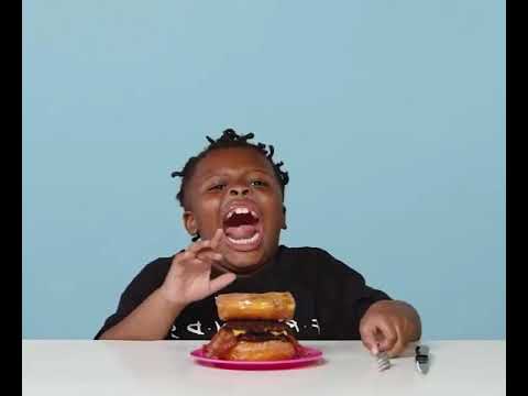 black-kid-laughing-at-a-burger