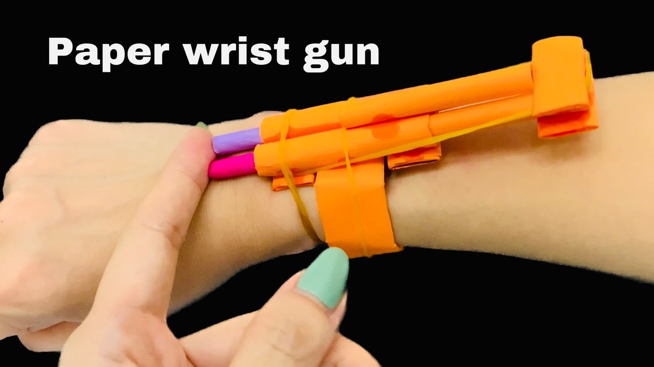 Diy best Paper Wrist Gun / How to make a paper gun that shoots far and