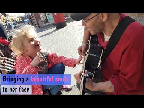 6 year old girl who is blind and autistic plays guitar for the first time