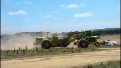 terex scraper and cat D8 dozer at work