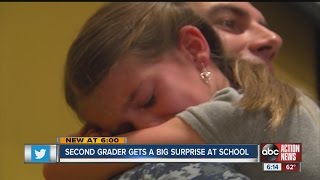 Navy dad surprises daughter at school