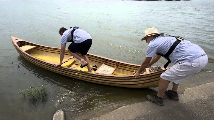 In handcrafted canoe, Missouri man and grandson wi...