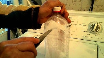 Homemade sap containers. "Making Sap Into Syrup"