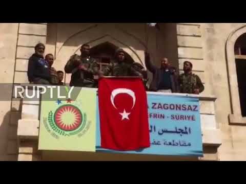 Syria: FSA militants hang Turkish flag over Afrin legislative council building
