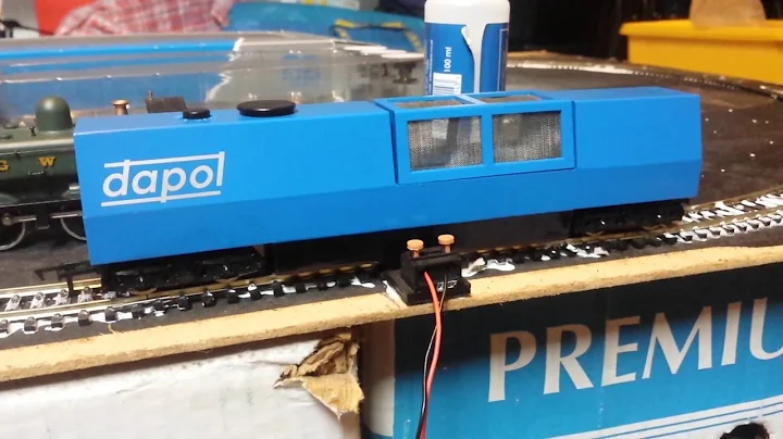 OO Dapol motorised Track Cleaning Wagon being assessed before ebay listing