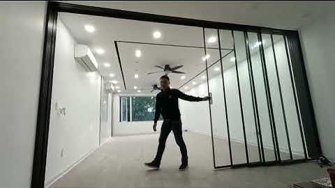 Công trình thi công vách lùa cánh kính cường lực không ray dưới 3 cánh,5 cánh cho khách hàng Boloni