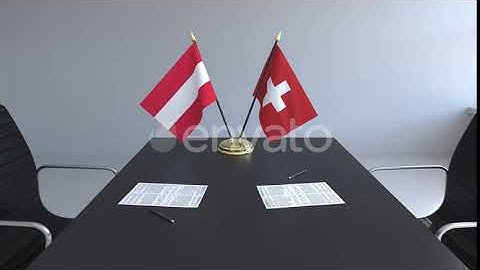 Flags of Austria and Switzerland and Papers on the Table | Motion Graphics - Envato elements
