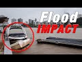 Huge wharf impacts boat during Brisbane River Floods in QLD, Australia