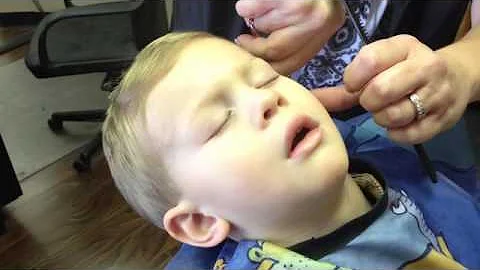 Matthew falls asleep during his haircut.  Again.