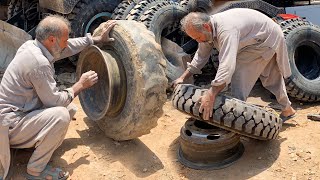 How to Change Excavator Tires Manually || Changing Heavy Equipment Tires by Hand