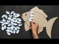 Unique fish wall hanging craft idea  best out of waste cardboard and spoons  home decoration