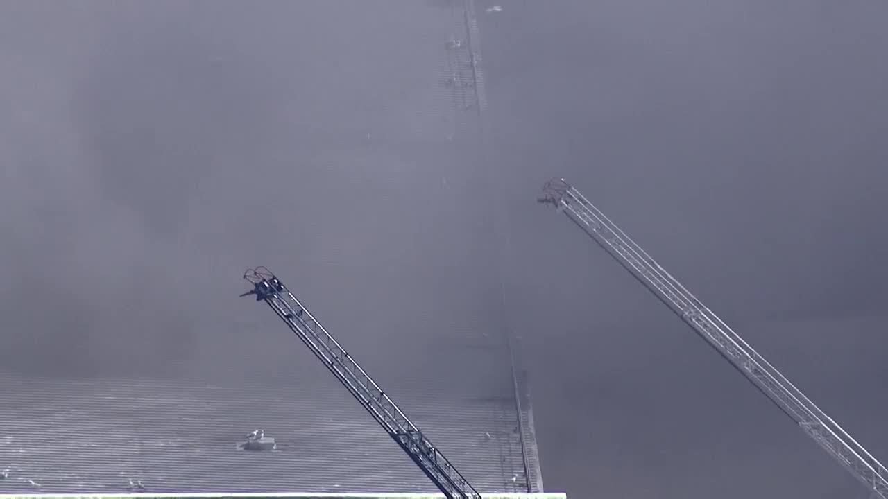 Video: Firefighters battle fire at recycling plant - YouTube