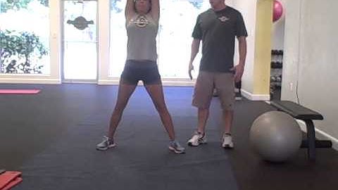 Sumo squat curl to press