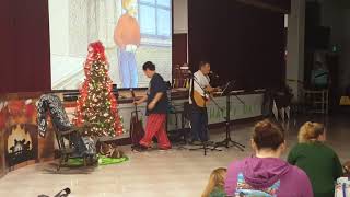 Tr Jackson Pre-K Center Students Dance To Holiday Music At A Head Start Literacy Event