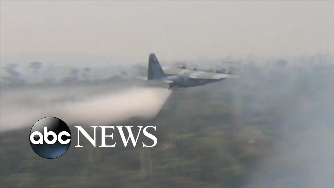 Brazil's air force deployed tankers to drop water on the Amazon as it burns