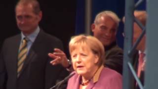 Angela Merkel huiduită în timpul unui miting din Baden