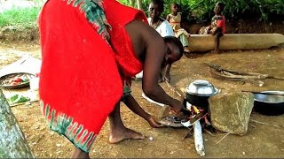 African Village Life\/\/Organic Moms Cooking Cornflour with Nutritious Vegetables for Lunch.