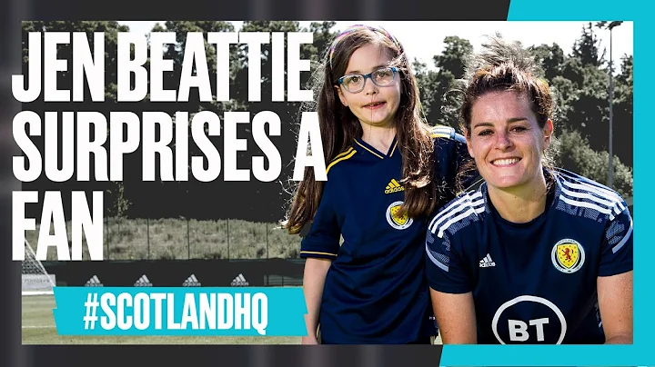 Jen Beattie surprises a young fan at SWNT training...