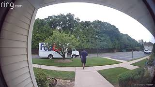 FedEx driver tossing packages