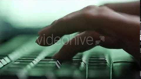 Hands of Woman Hacker Typing on Keyboard