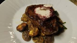 Texas wagyu tenderloin with roasted marble potatoes and spinach saute