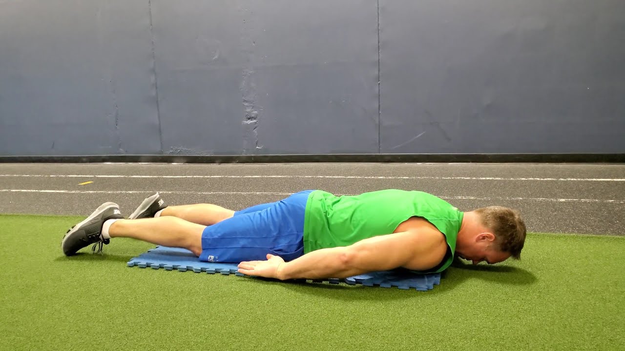 Back Extension Prone arms at side, palms up to palms down YouTube