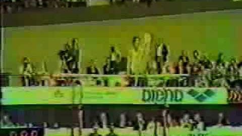 Parallel bars. Kip back to V-sit