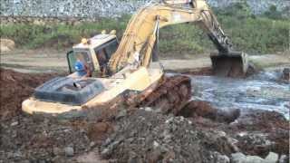 : Will he ever get this excavator out?