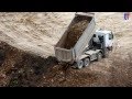 Mercedes-Benz Actros Dump Truck Unloading Earth, Germany, 2014.