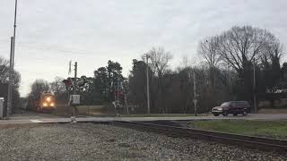Conductor gets on front of engine and waves with BNSF BNSF!