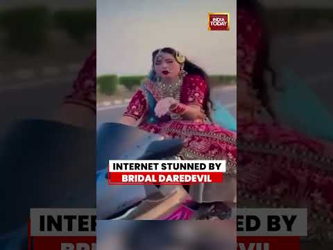 Viral Video: Wedding Dress Bike Stunt Leaves Viewers Stunned #viral #bride #bikestunt #moradabad