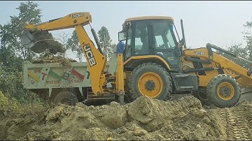 Jcb 3dx Backhoe Machine cutting hill soil and loading soil in Heavy tata Truck@roadtrendmachinework