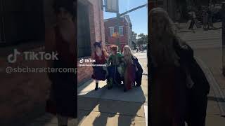 Halloween 2025: Costumes:  The "Hocus Pocus" Witches (Sanderson Sisters) do "The Walk"  on a street