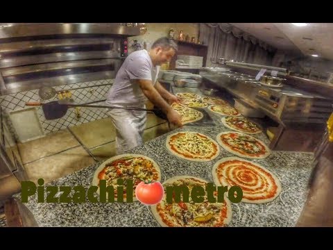 An evening at Pizzeria The infinite with master Mario Petrolo Admire the art of Pizzaiolo