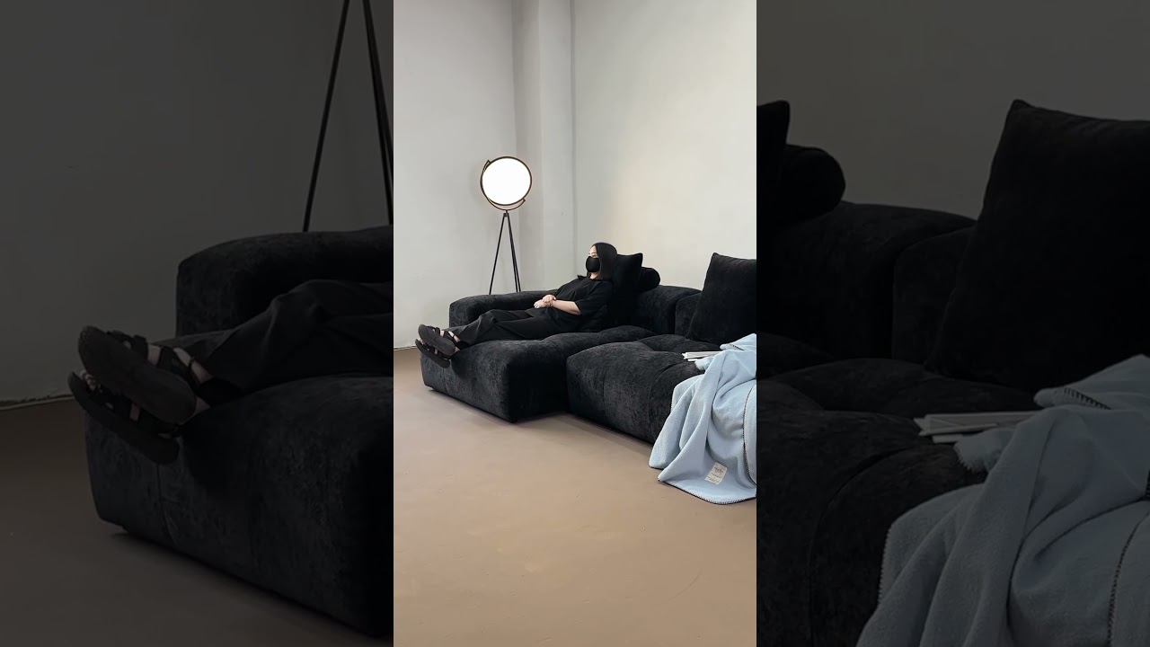 Black Sofa in Quiet Light – Simple, Calm, and Strong  