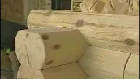 How to install log siding saddle-notch corners