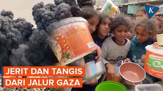 Potret Pengungsi Gaza Berebut Makanan di Dapur Umum Rafah