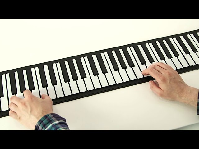 Piano portatif électronique de rouleau de main de piano enroulable avec 128  tonalités uniques Main Roll Piano 88 Touches Silicone 88 Touches Roll Up