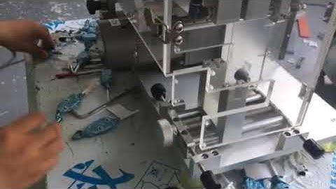 Lollipop flag labeling machine