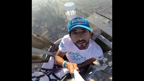 ولي عهد دبي فزاع يصعد لقمة برج خليفة أعلى برج بالعالم ويرفع علم الإمارات 