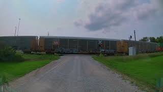 Slow and short southbound Union Pacific stack train in Cambridge, Iowa on the Spine Line
