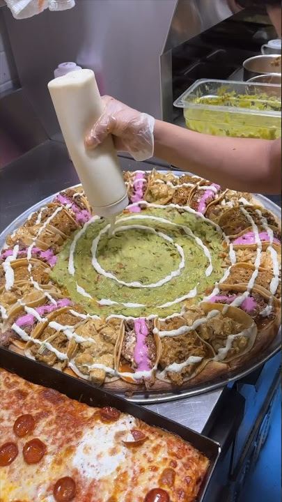 The INSANE TACO PIZZA from Tony Boloney’s in Jersey City, NJ! 🌮🌮🌮🍕🍕🍕 Wow. #DEVOURPOWER