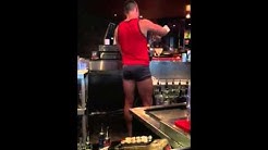 Bouncing bubble butt bartender at all male waiter restaurant in Dallas Texas 