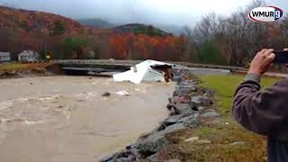 Raw video: Warren home partially swept away by floodwaters