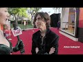 Aidan gallagher talks about his music at the offer red carpet
