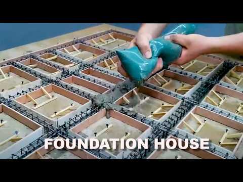 MAN BUILDING THE FOUNDATIONS OF A SMALL WOODEN HOUSE !!!