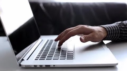Hand Typing On A Laptop Stock Video