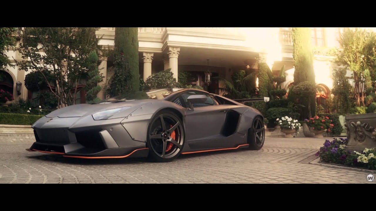 Liberty Walk Lamborghini Aventador Wrapped in brushed steel with orange