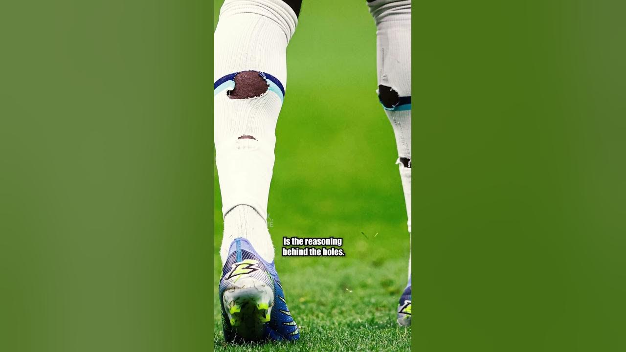 Explained: Why do footballers cut holes in their socks?